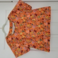 IC023  Pablo Flowers  ORANGE / MLT  Softened 100% Cotton Light (4.4 oz/yd<sup>2</sup>)
